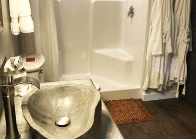 Escalante Yurts Luxury Yurts bathroom with white robes e1666127268415