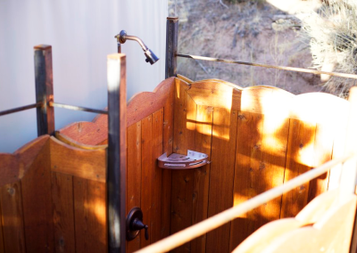 Our luxury yurts set up beneath a stunning sunset backdrop.