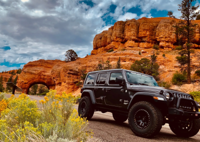 Escalante yurts Jeep Rentals epic jeep driving down escalante road